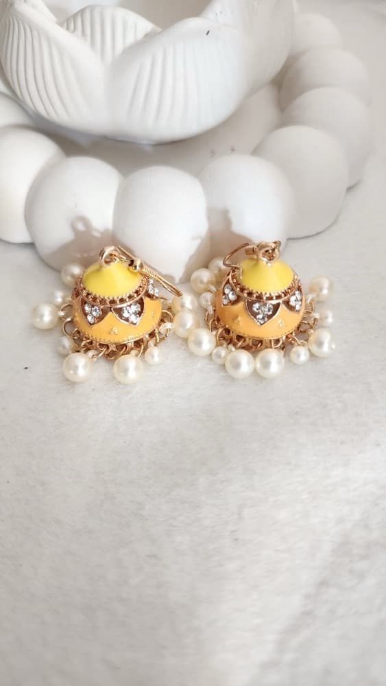 Yellow Enamel-pearl Jhumka, photographed against a plain background