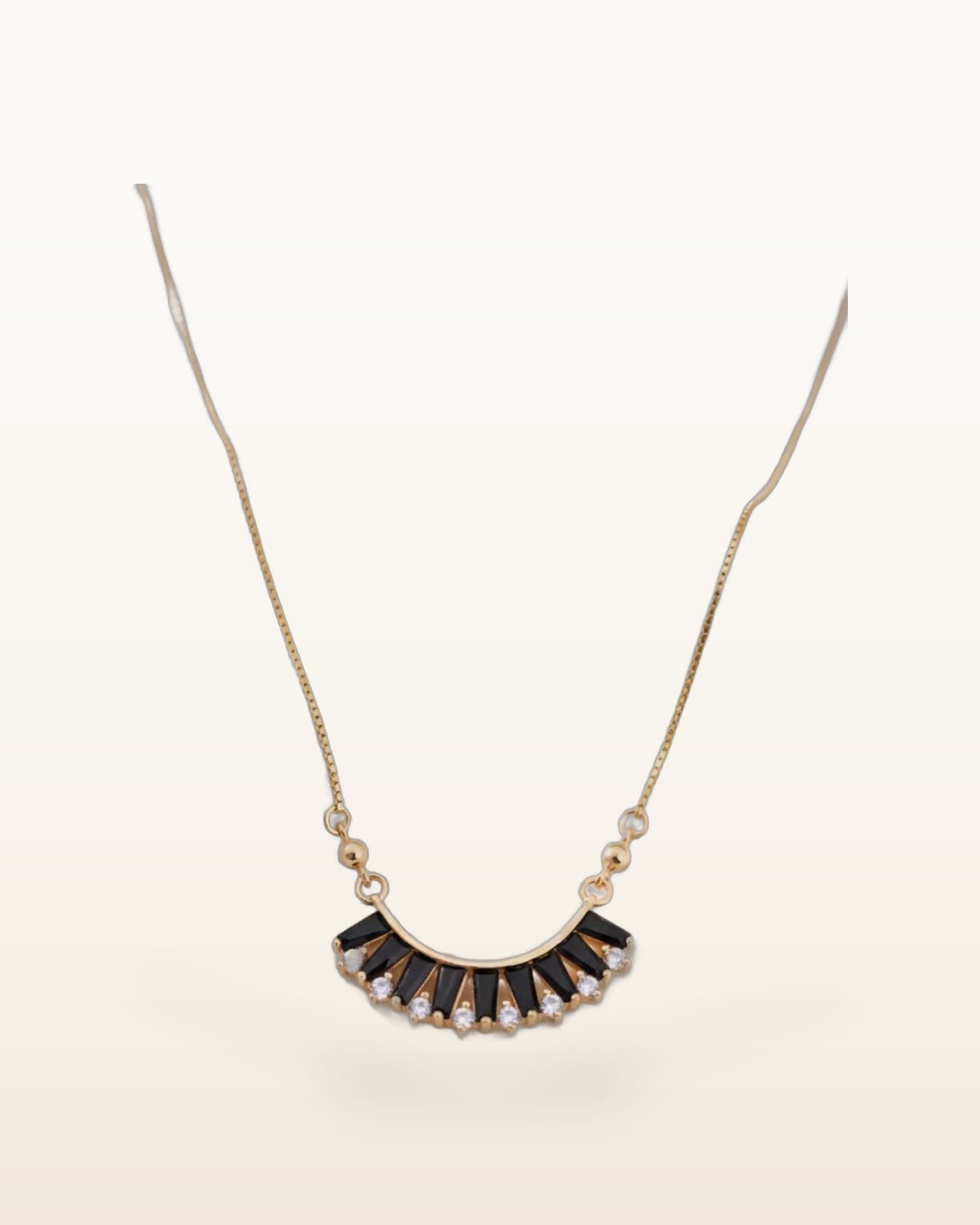 Midnight Arc Zircon Necklace, photographed against a plain background