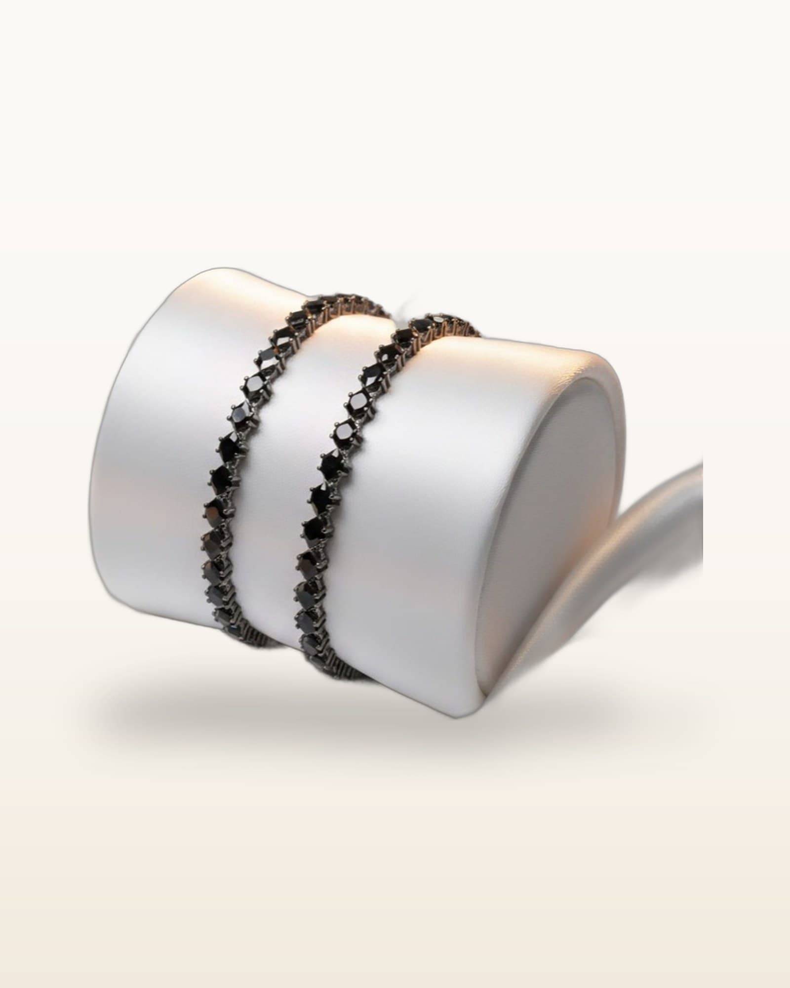 Black Diamond-Shape Stone Flexible Bangle – Silver Undertone Finish, photographed against a plain background