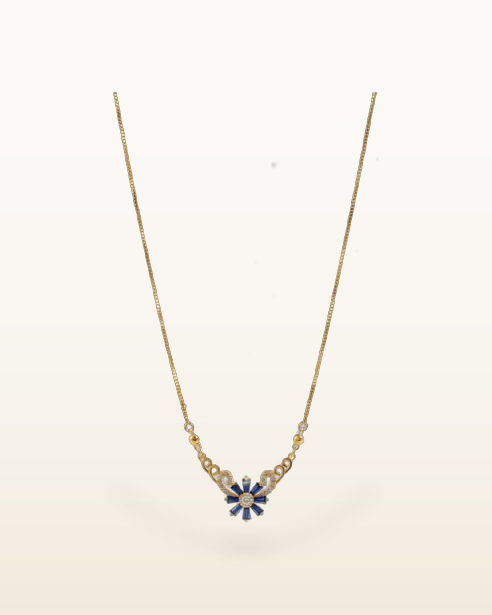 Ocean-Blue Floral Zernish Pendant, photographed against a plain background
