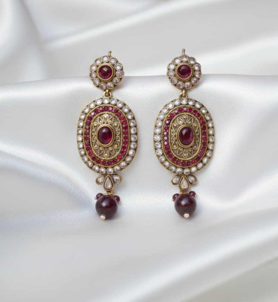 Royal Noor Red Kundan Statement Earrings, photographed against a plain background