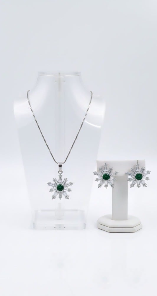 Emerald snowflake zircon set presented as a gift