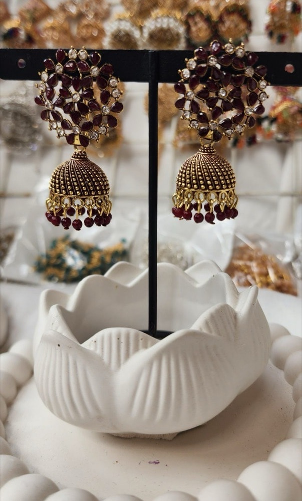 Mehroon stone copper base Jhumka (Medium size), photographed against a plain background