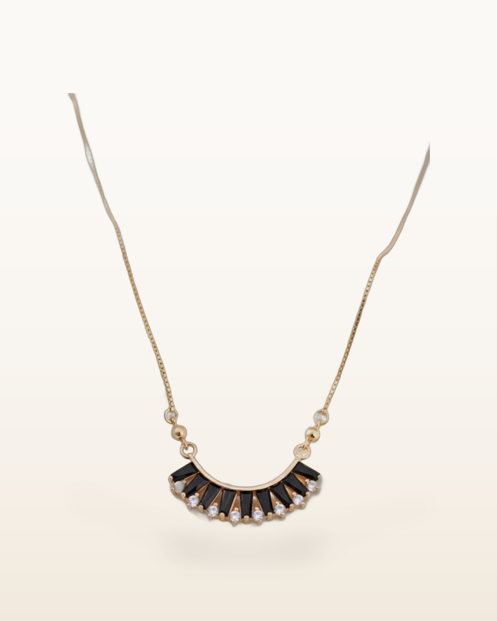 Midnight Arc Zircon Necklace, photographed against a plain background