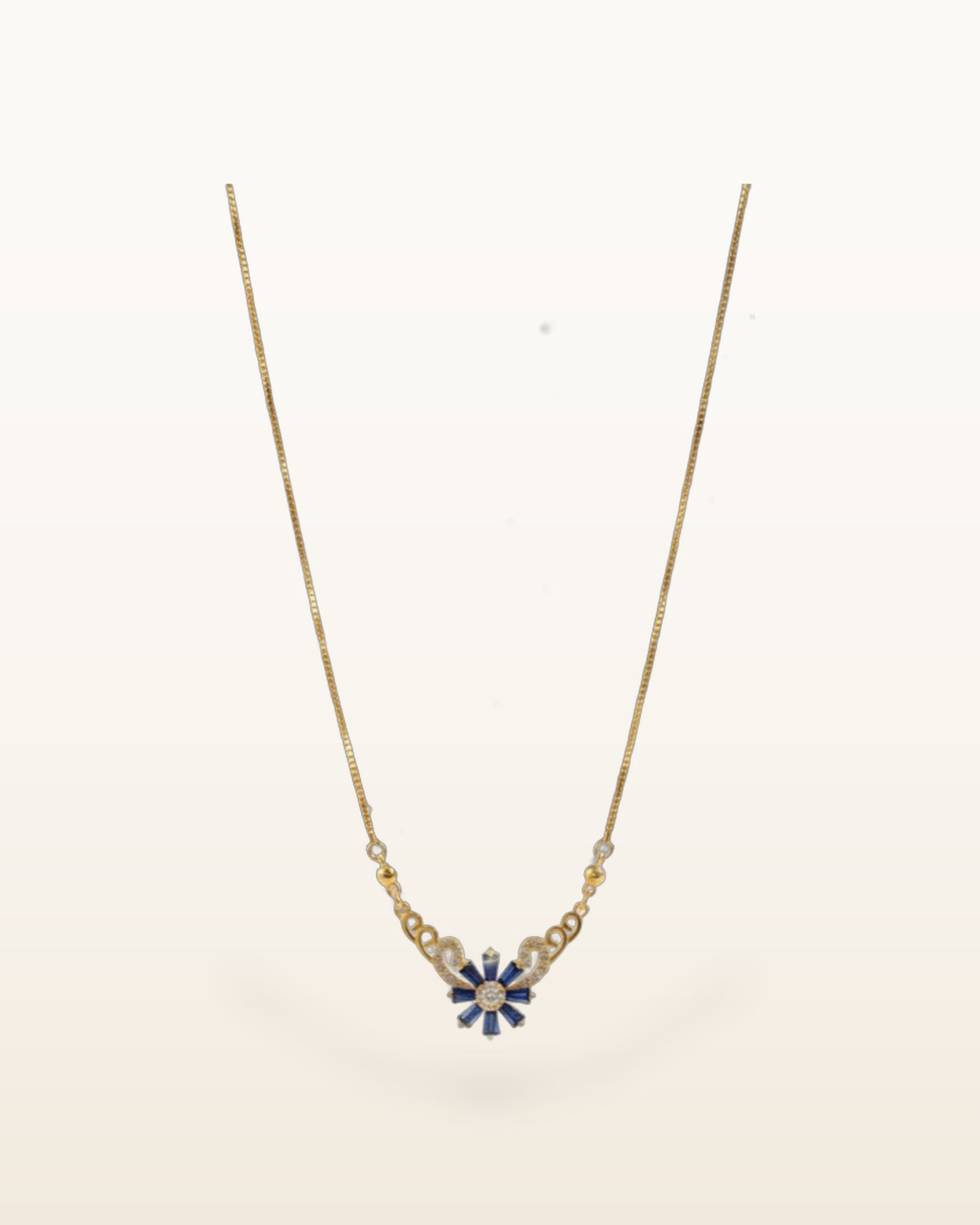 Ocean-Blue Floral Zernish Pendant, photographed against a plain background
