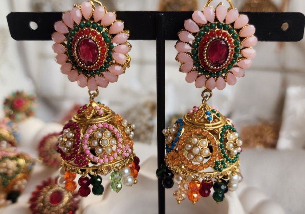 Rajwari Milky-Pink with multi-color mini pearl indented(Medium) Jumka Earrings, photographed against a plain background