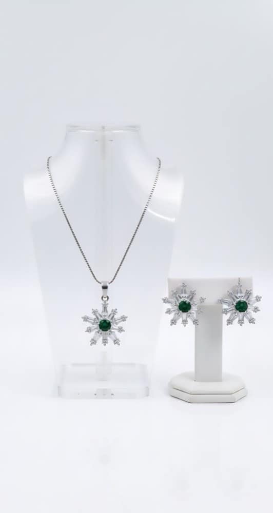 Emerald snowflake zircon set presented as a gift